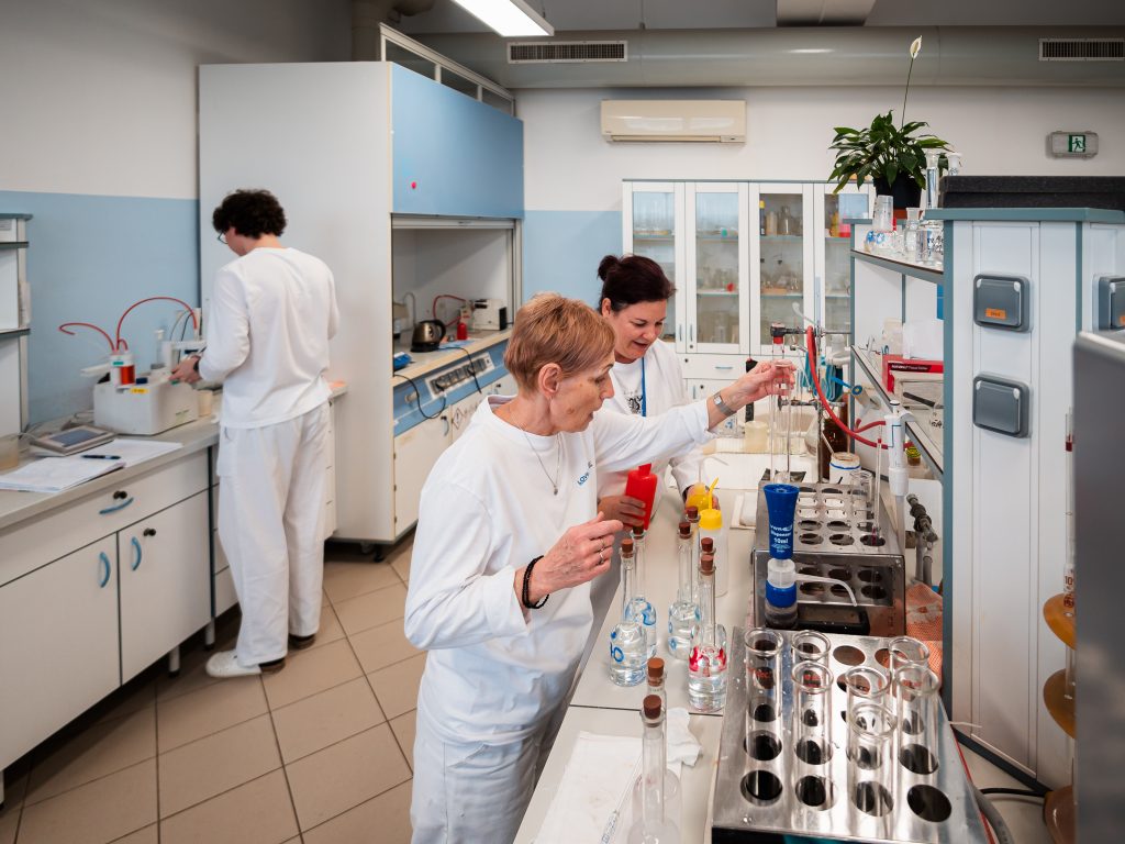 Scientists conducting experiments in a laboratory.